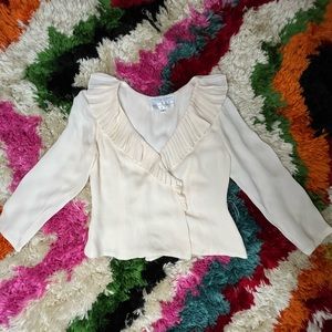 Carolina Herrera blouse.